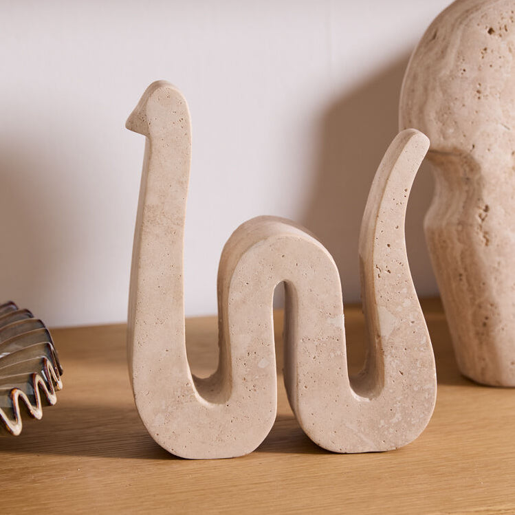 Kingsnake Sculpture, tan travertine snake sculpture