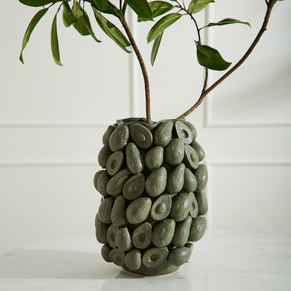 Layered Avocado Vessel close-up view, dark green ceramic avocado vessel