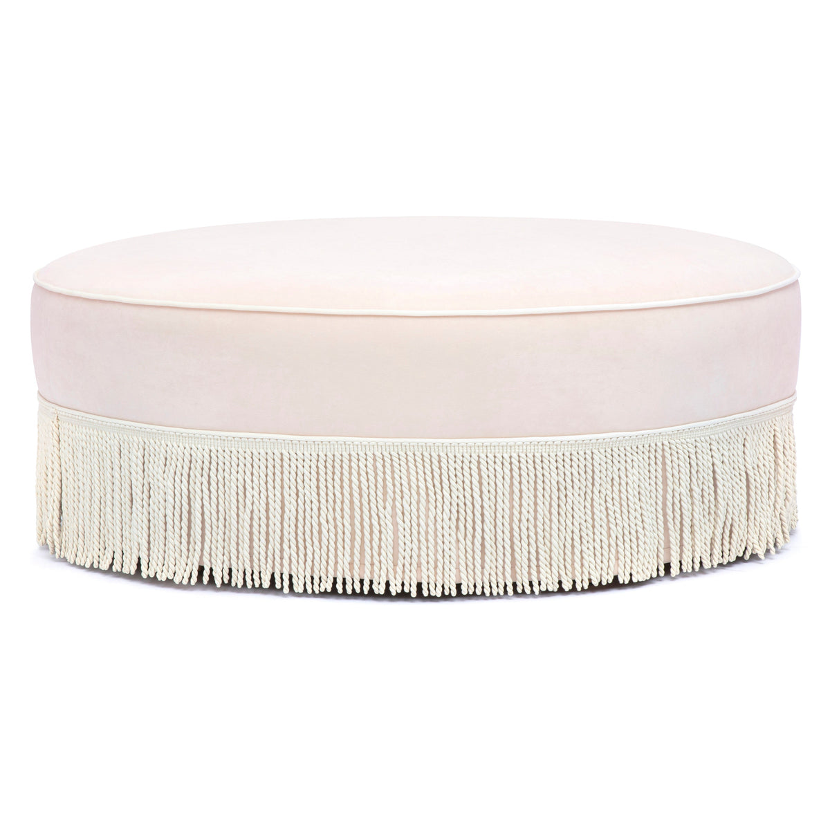 TOV Furniture Tassy Tasseled Round Ottoman in pink velvet with fringe trim, primary product view