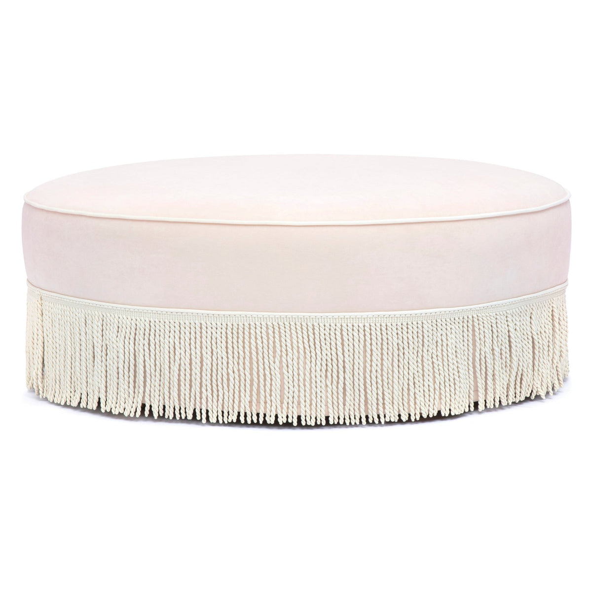 TOV Furniture Tassy Tasseled Round Ottoman in pink velvet with fringe trim, primary product view