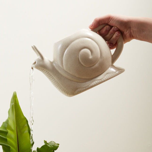 Slowpoke Watering Can, a off white ceramic home decor accent