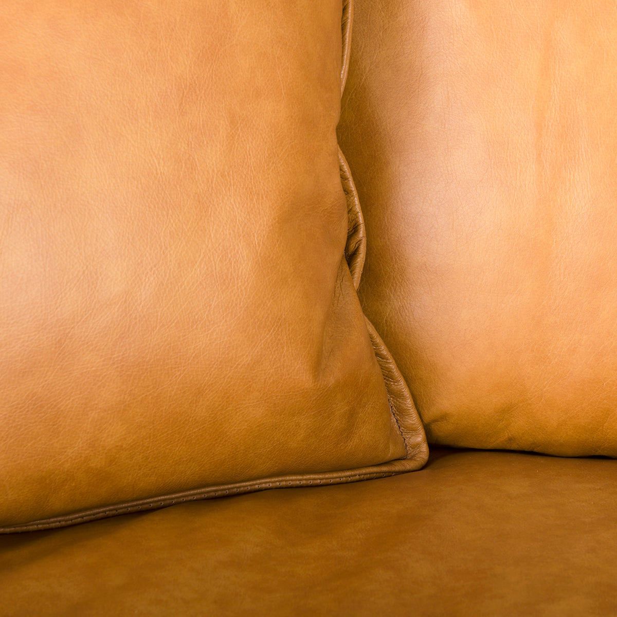 Mercana D'Arcy 111"L x 70"D x 33"H Tan Leather Right Chaise Sectional