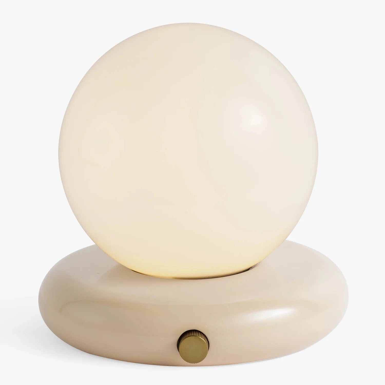 Co. House Designs Valencia Cream Portable Table Lamp illuminated and glowing
