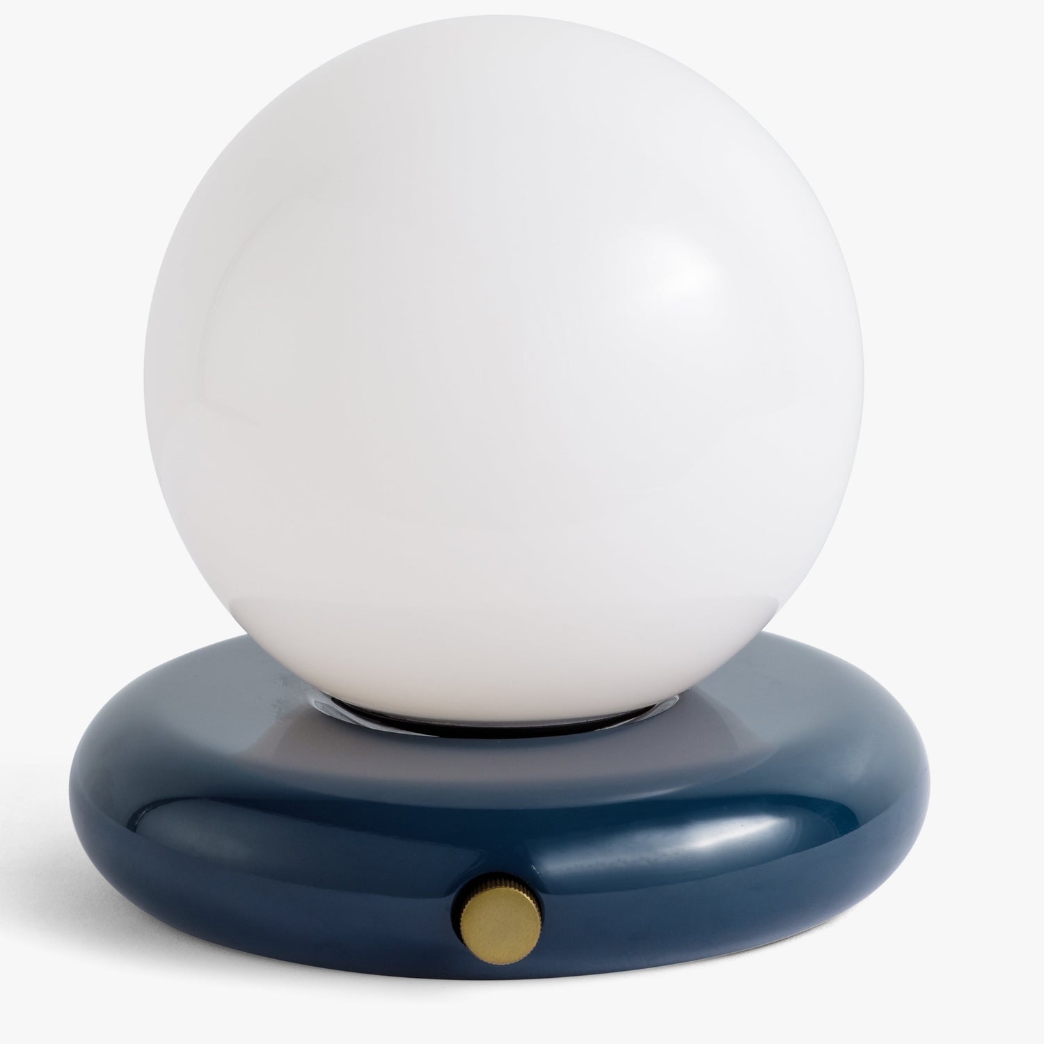 Co. House Designs Valencia Navy Portable Table Lamp shown with the light off