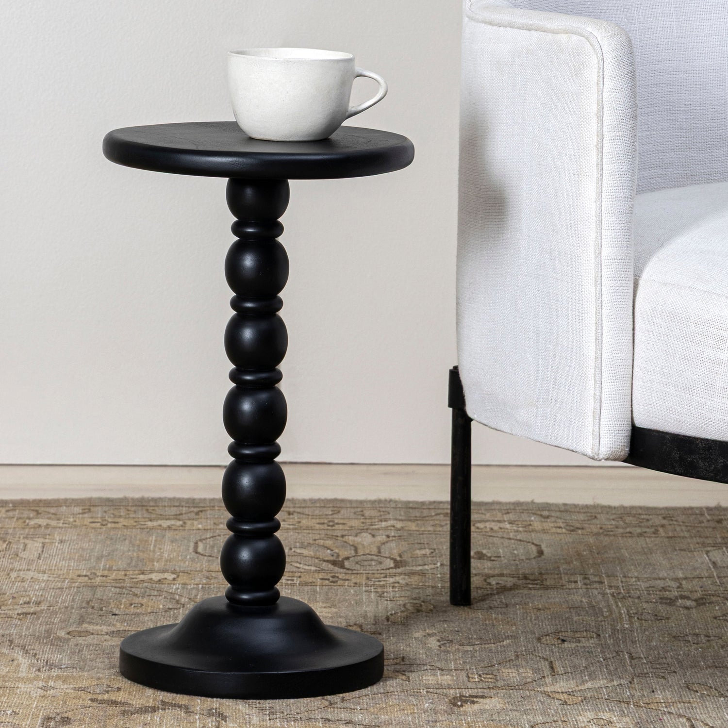Co. House Designs Spindle Black Drink Table styled in a room setting