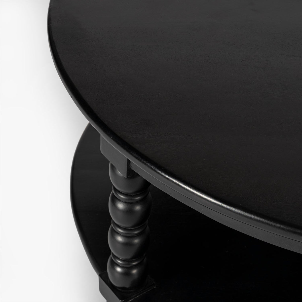 Close-up detail of the Co. House Designs Spindle Black Coffee Table