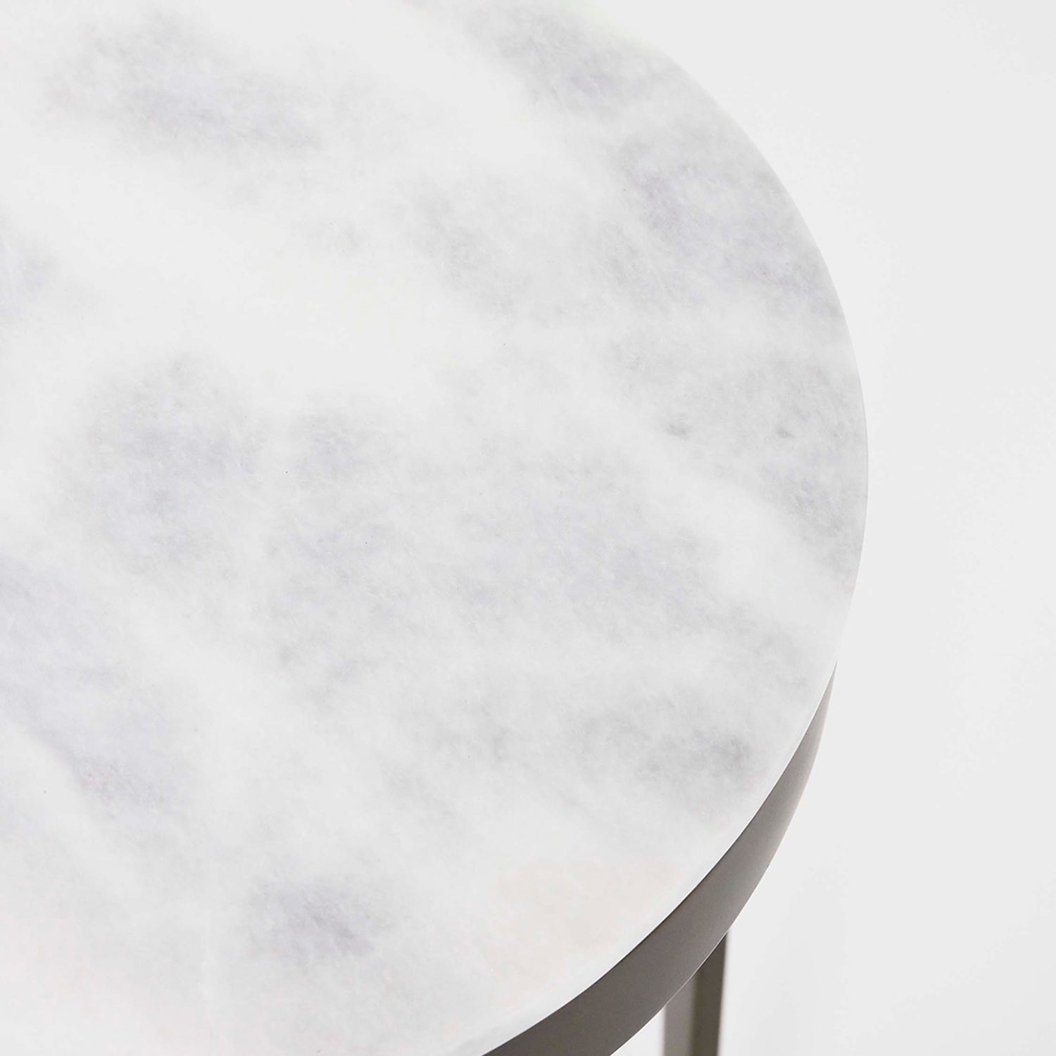 Detail of the tabletop on the Interlude Home Camilla  Ice Jade Drink Table