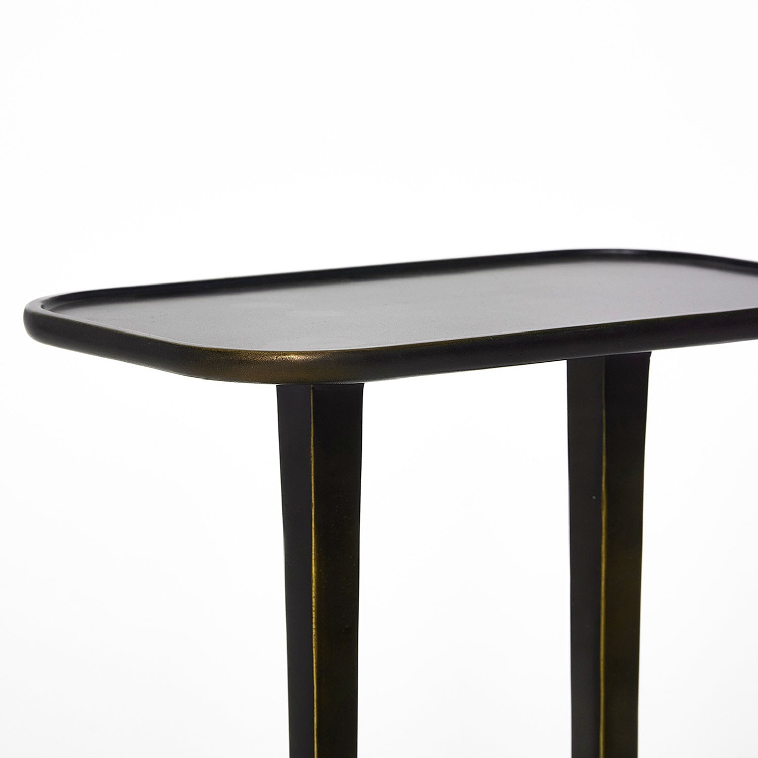 Close-up of the Aluminum finish on the Interlude Home Axel Deep Bronze Drink Table