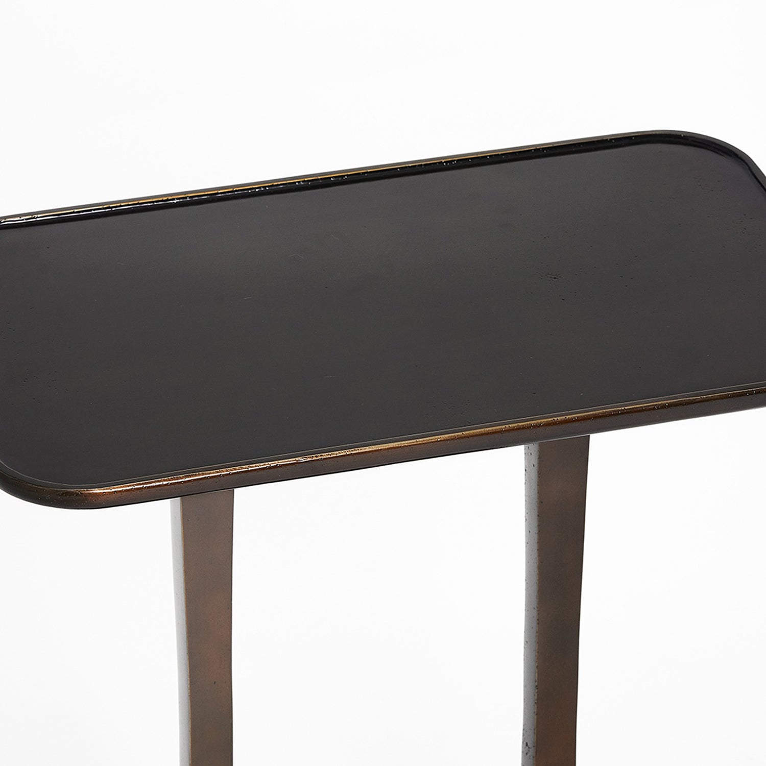 Detail of the tabletop on the Interlude Home Axel Deep Bronze Grand Table