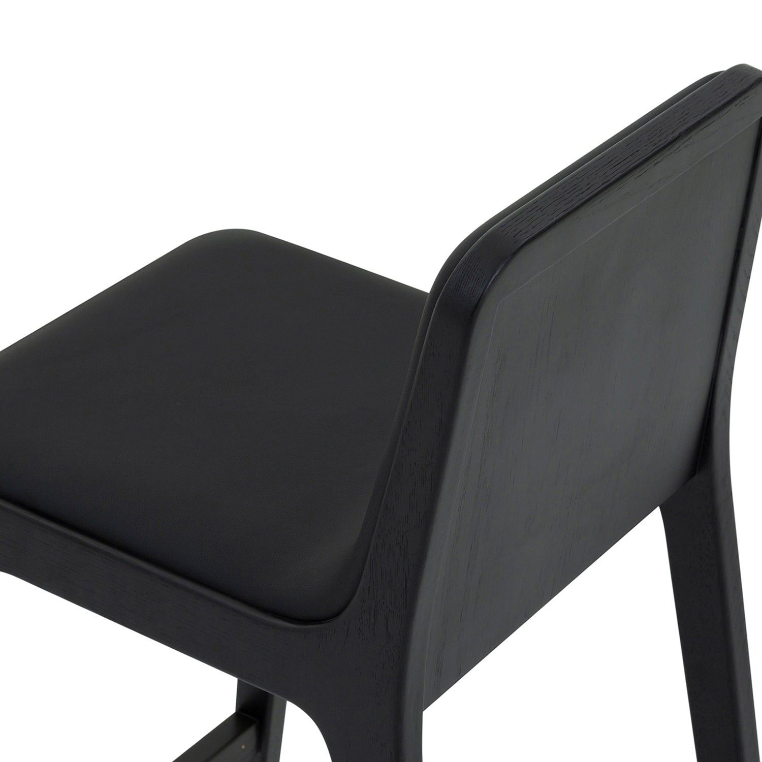 Detail of the foot-rail on the Interlude Home Florent Matte Black  Bar Stool