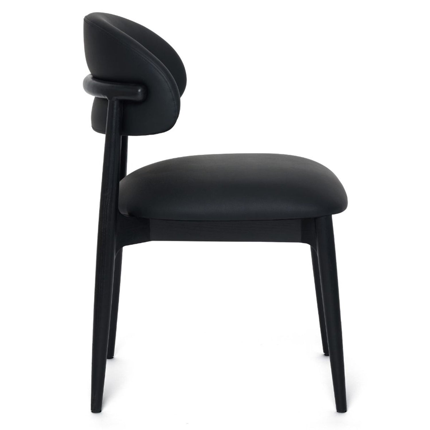 Liam Midnight Dining Chair Set of 2 styled in a room to show its dining chair scale and proportions