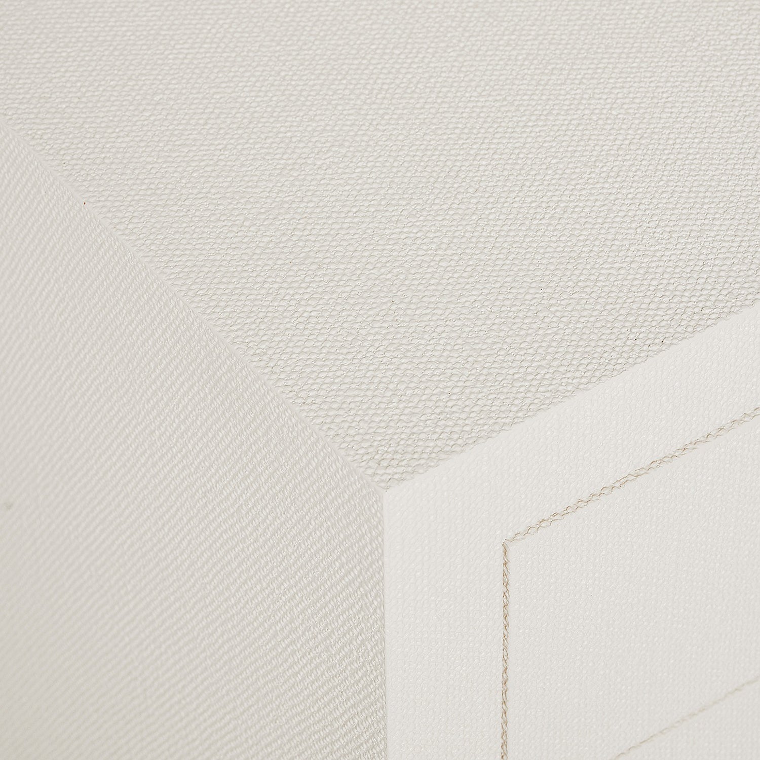 Montaigne White Tall Bedside Chest in wood Natural White finish, styled in a room setting