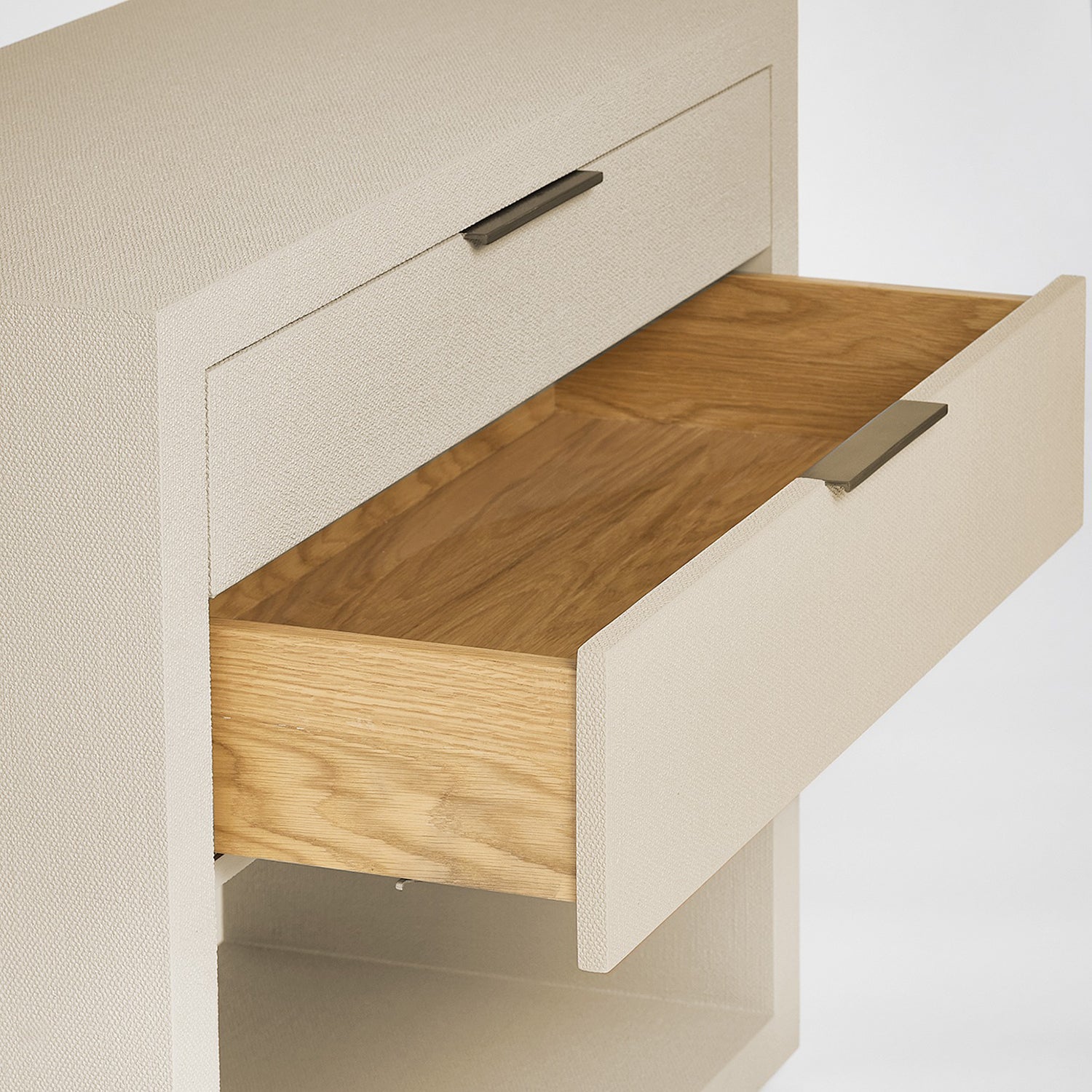 Montaigne Sand Tall Bedside Chest in wood Sand finish, side profile view