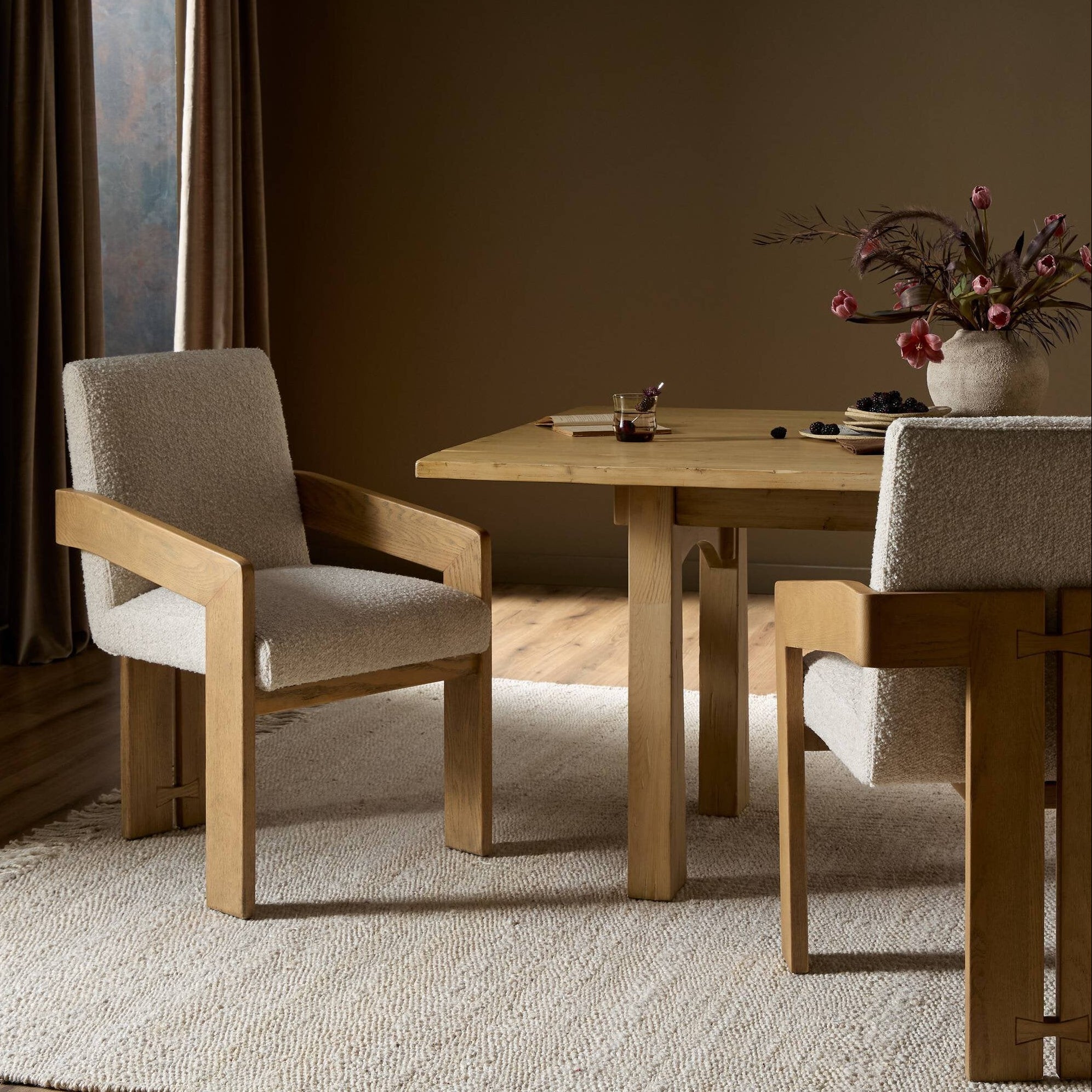 Four Hands Roxy Somerton Ash Dining Armchair styled in a room setting
