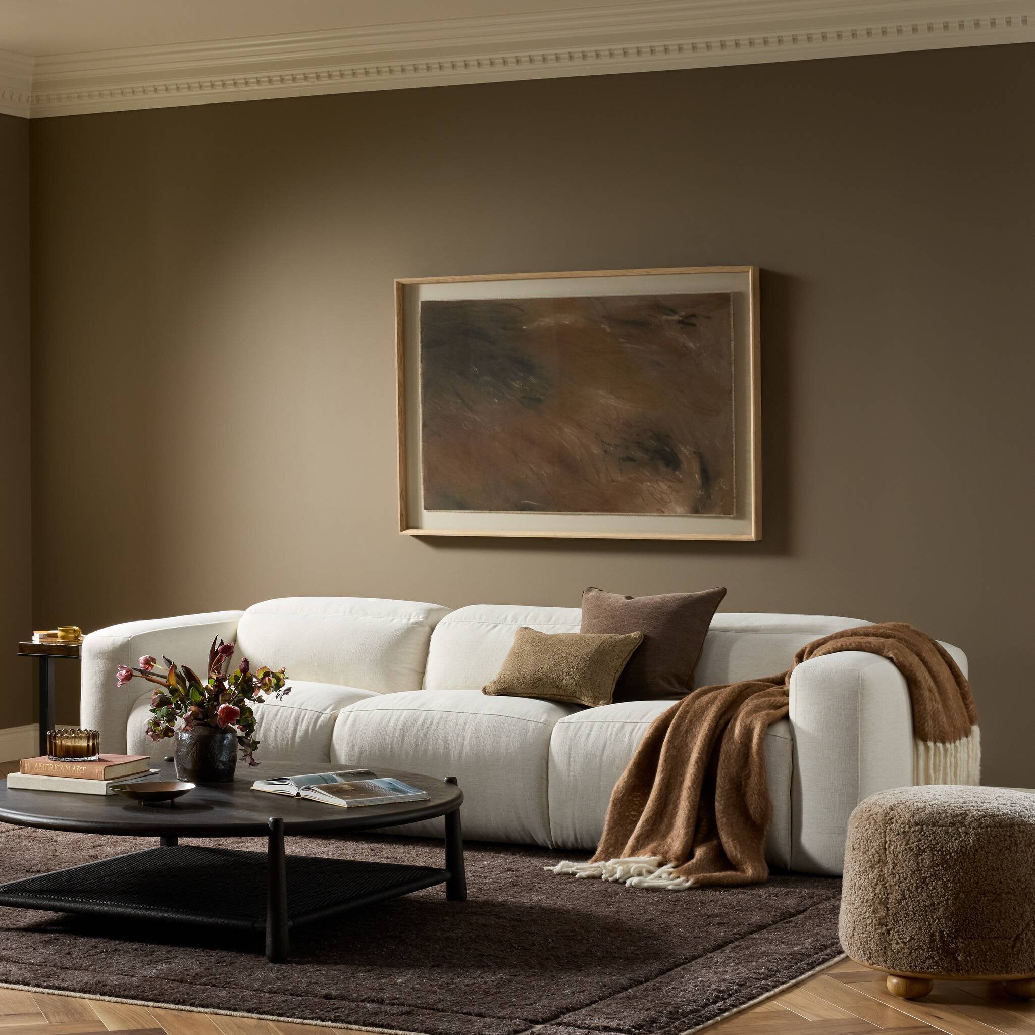Four Hands Radley Crypton Nomad Snow Power Recliner 3 Piece Sectional Sofa in a styled room setting