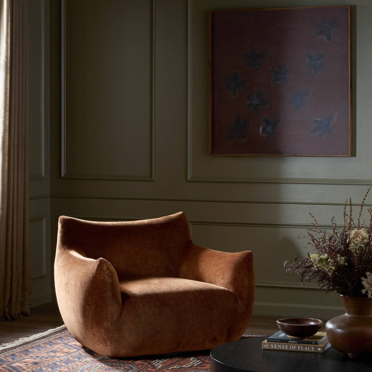 Four Hands Margot Altair Sienna Swivel Chair styled in a room setting