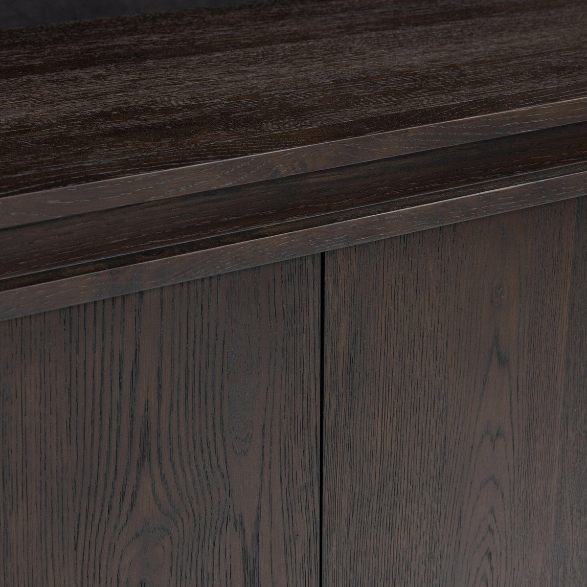 Four Hands Chalmers Smoked Black Resawn Oak Media Console material close-up