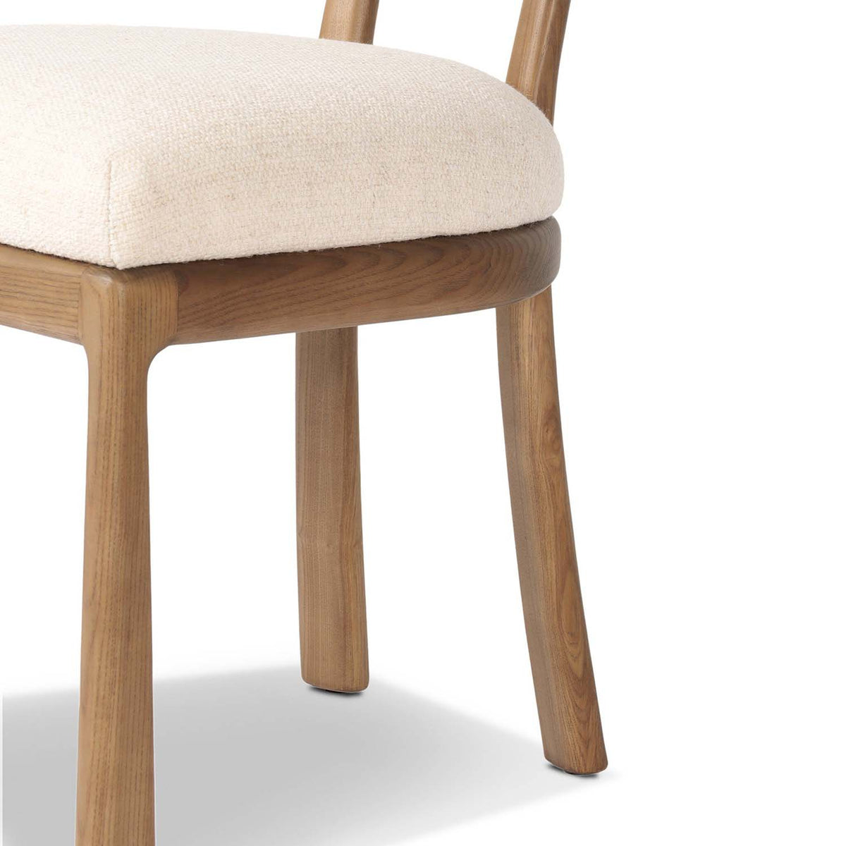 Close-up detail of the upholstered seat cushion of the chair.