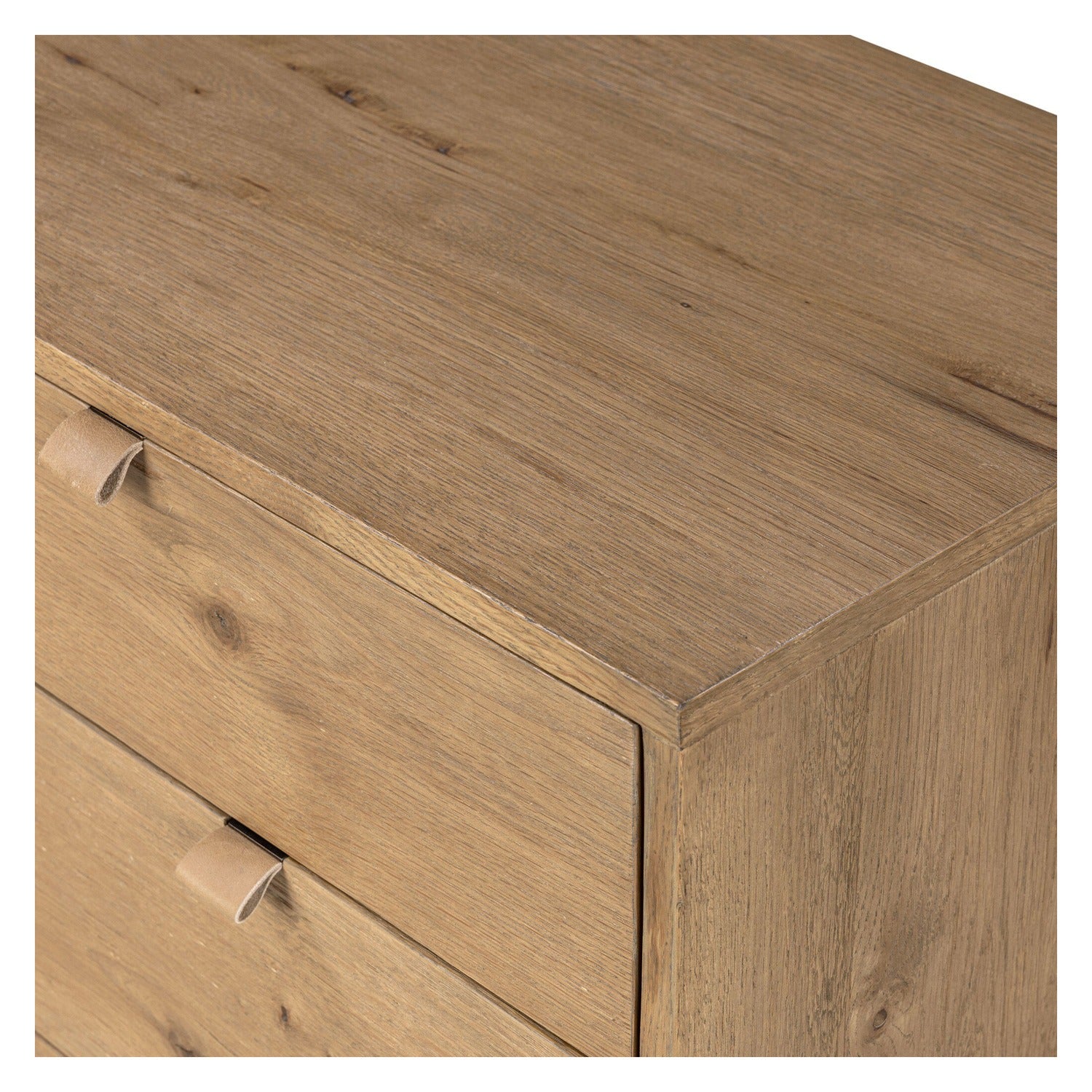 Four Hands Tula Worn Oak 7 Drawer Dresser with leather pulls, close-up detail of oak veneer, view 1