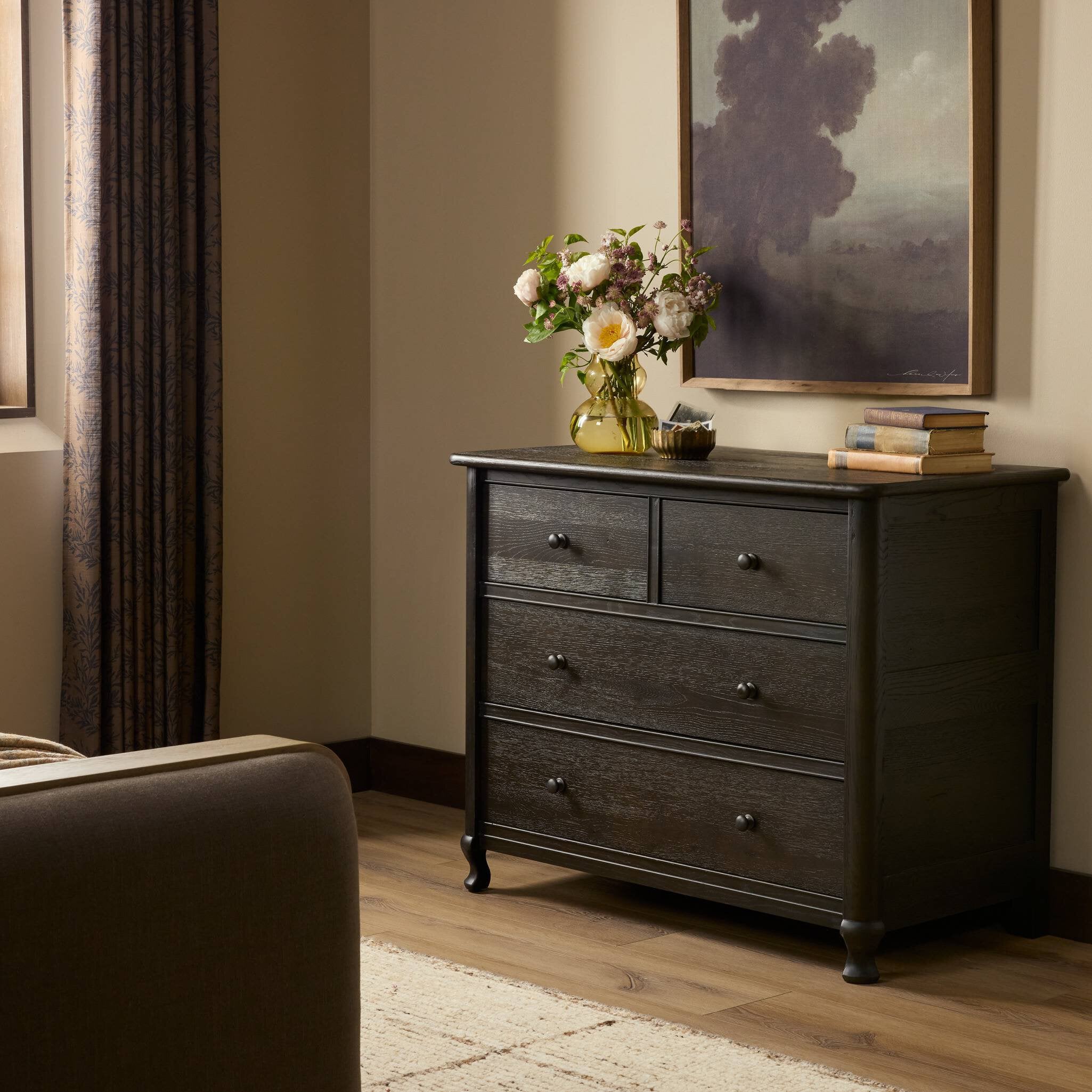 Four Hands Pika Smoked Black Oak Chest styled in a room setting
