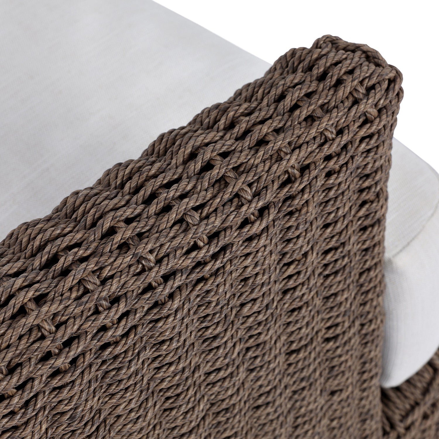 Four Hands Doane Outdoor Chair in dark twisted weave with cream cushion, close-up detail of weave, view 4