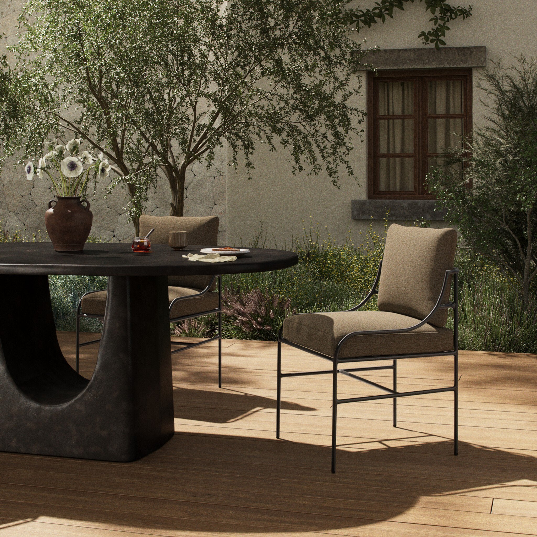Four Hands Segovia Alessi Fawn Outdoor Dining Chair — in a styled room setting