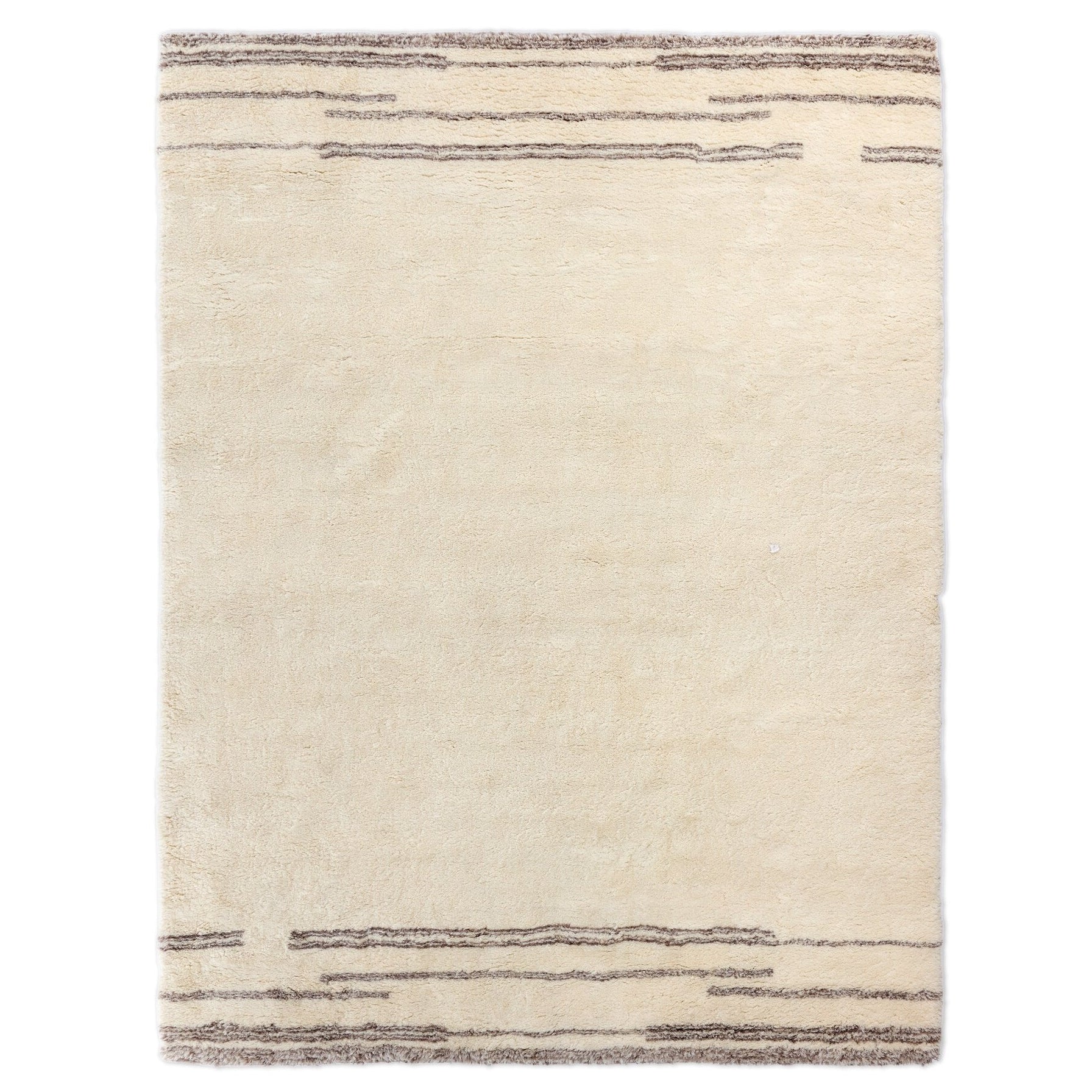 Four Hands Marbella Marbella Ivory Hand-Knotted Rug — styled view