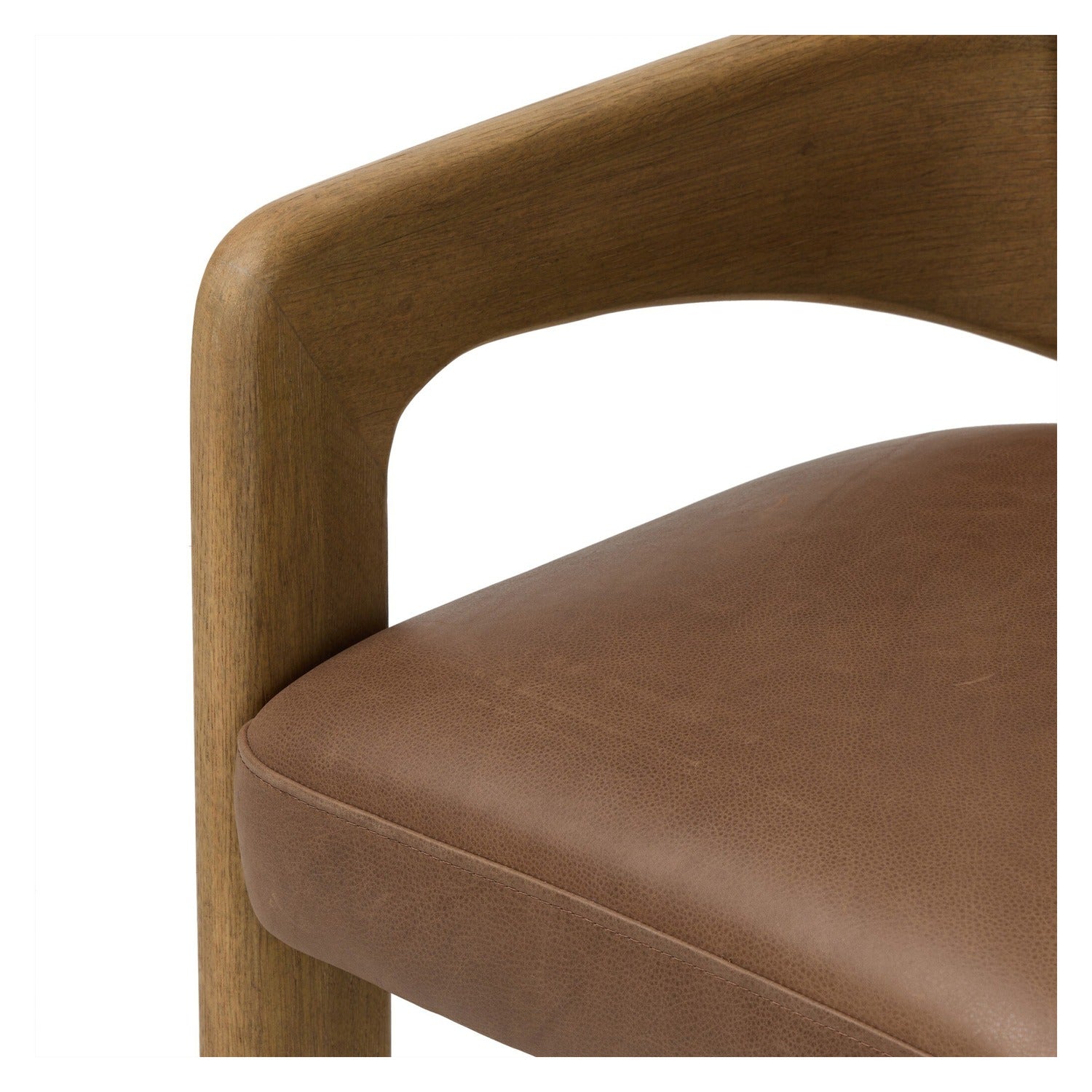 Four Hands Woltz Palermo Cigar Dining Chair on drifted oak tripod, close-up detail of leather, view 1
