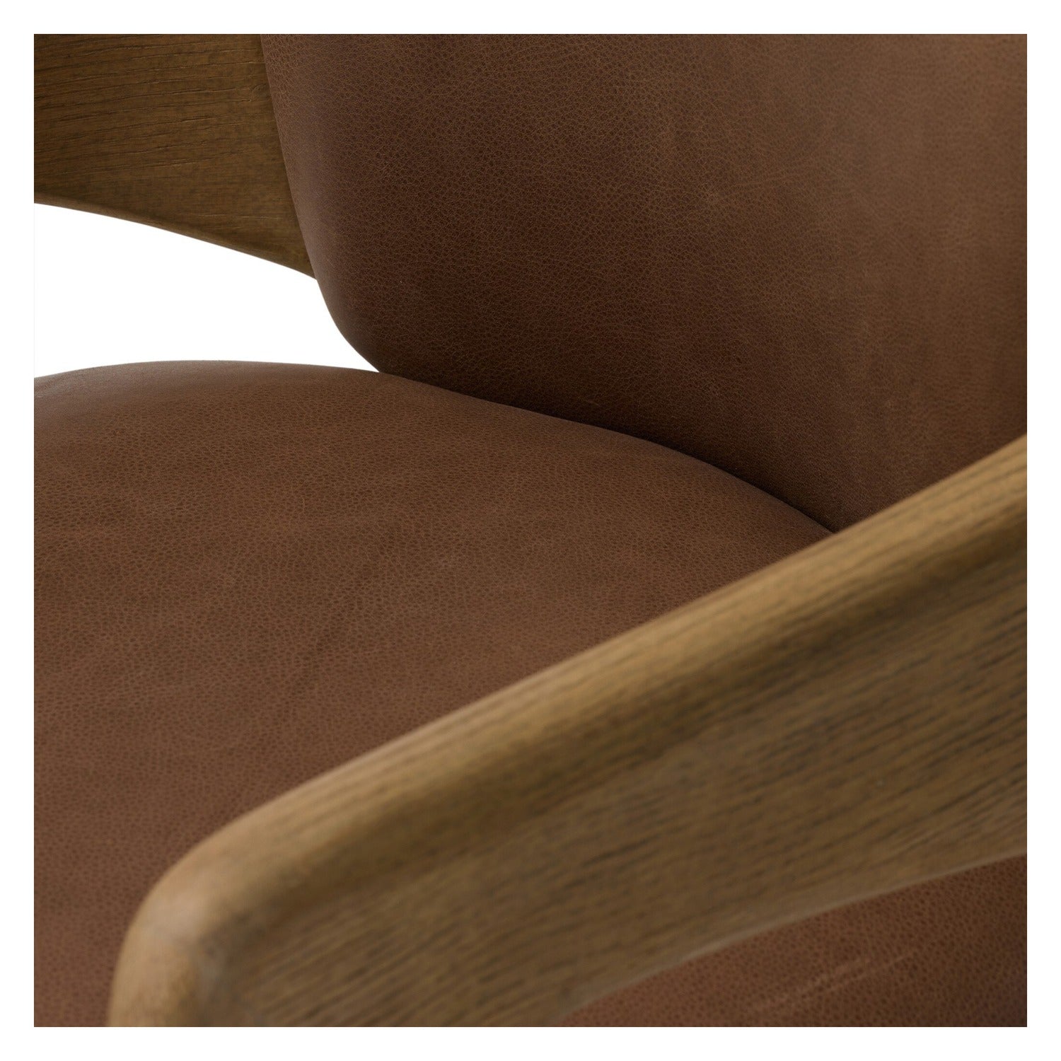Four Hands Woltz Palermo Cigar Dining Chair on drifted oak tripod, close-up detail of leather, view 2