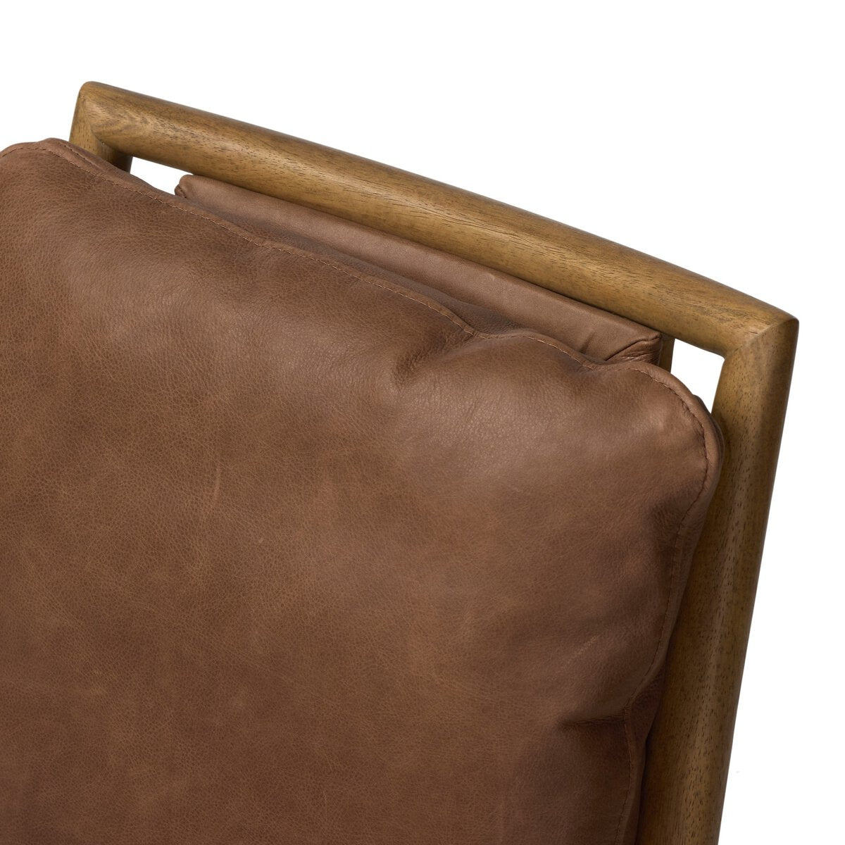 Four Hands Gallagher Palermo Cigar Dining Chair in top-grain leather on drifted parawood, close-up detail of leather, view 3