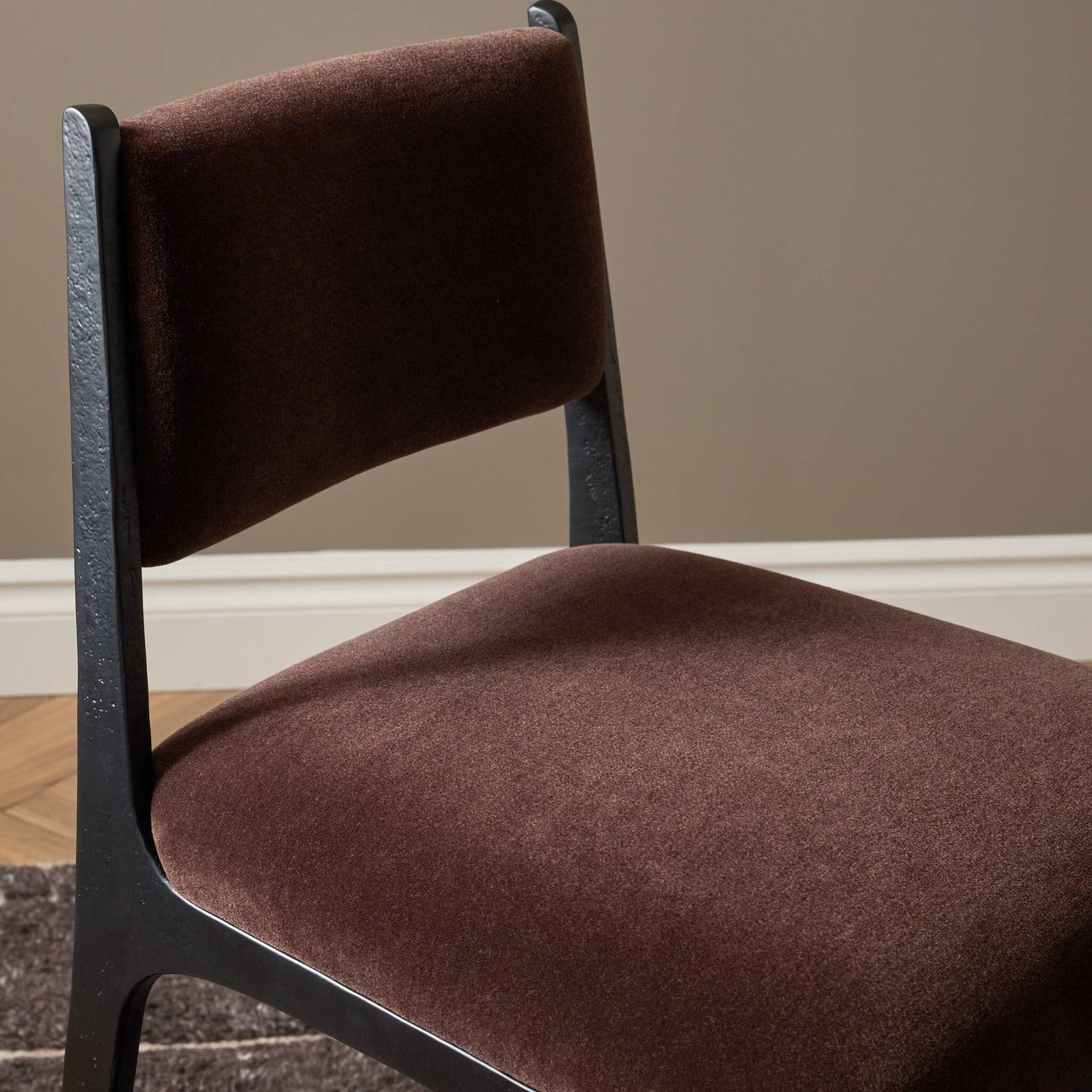 Four Hands Valeene Monte Chocolate Bar Stool Set of 2 on black cast aluminum, alternate styled view