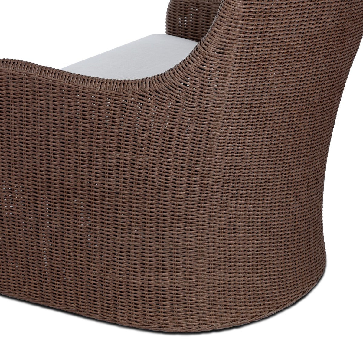 Four Hands Blaire Outdoor Chair in tanned woven with cream cushion, close-up detail, view 4
