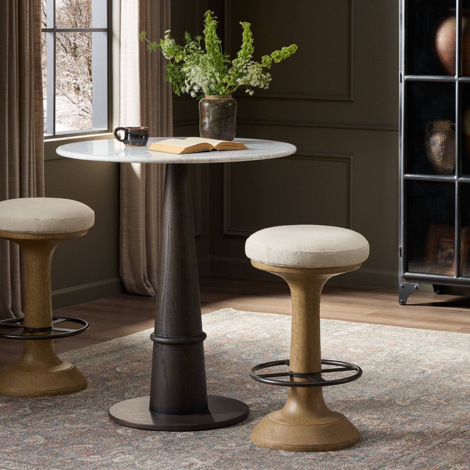 Four Hands Montclair Antwerp Natural Counter Stool styled in a room setting