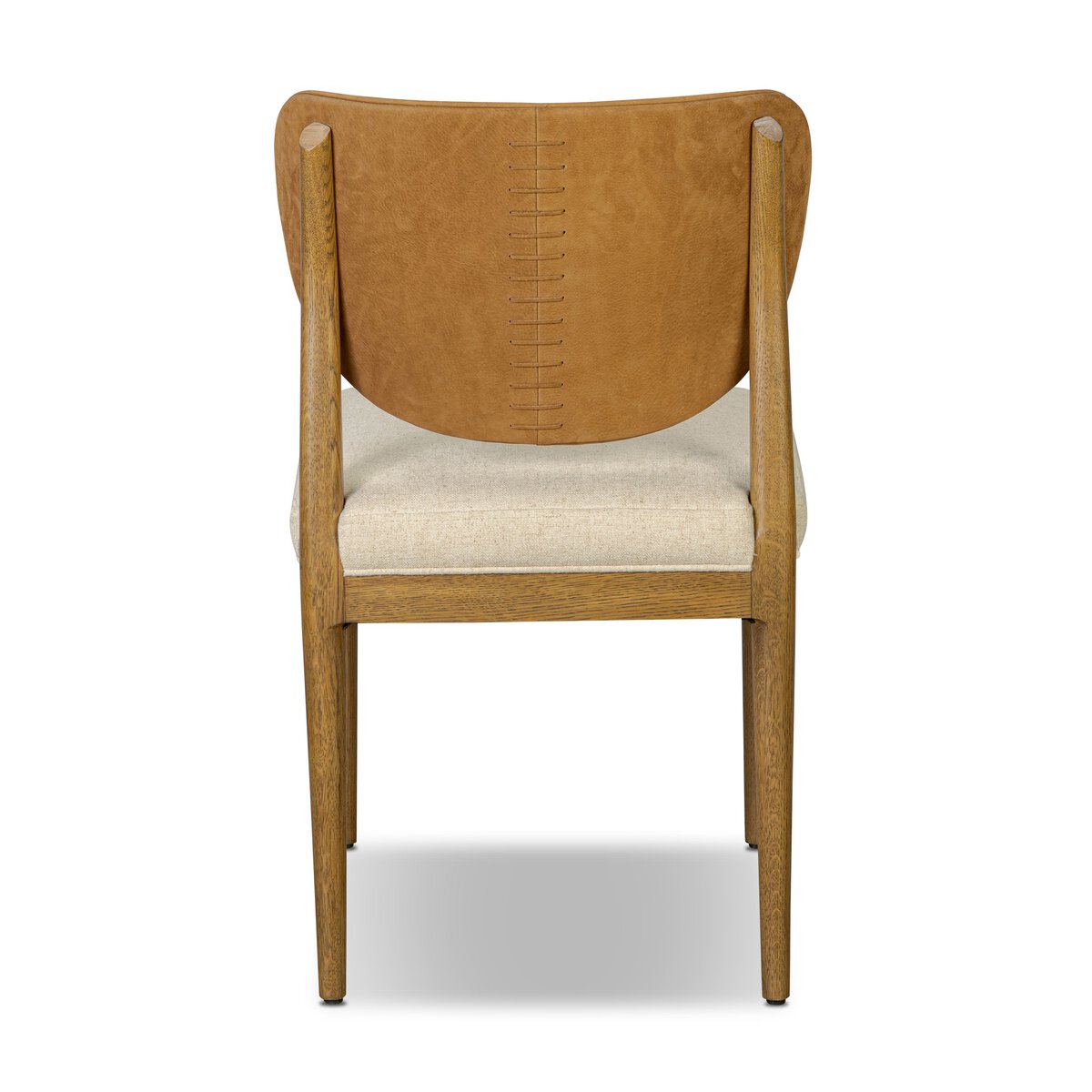 Four Hands Arlow Dining Chair in Nubuck Cognac leather back with natural linen seat on amber oak, back view