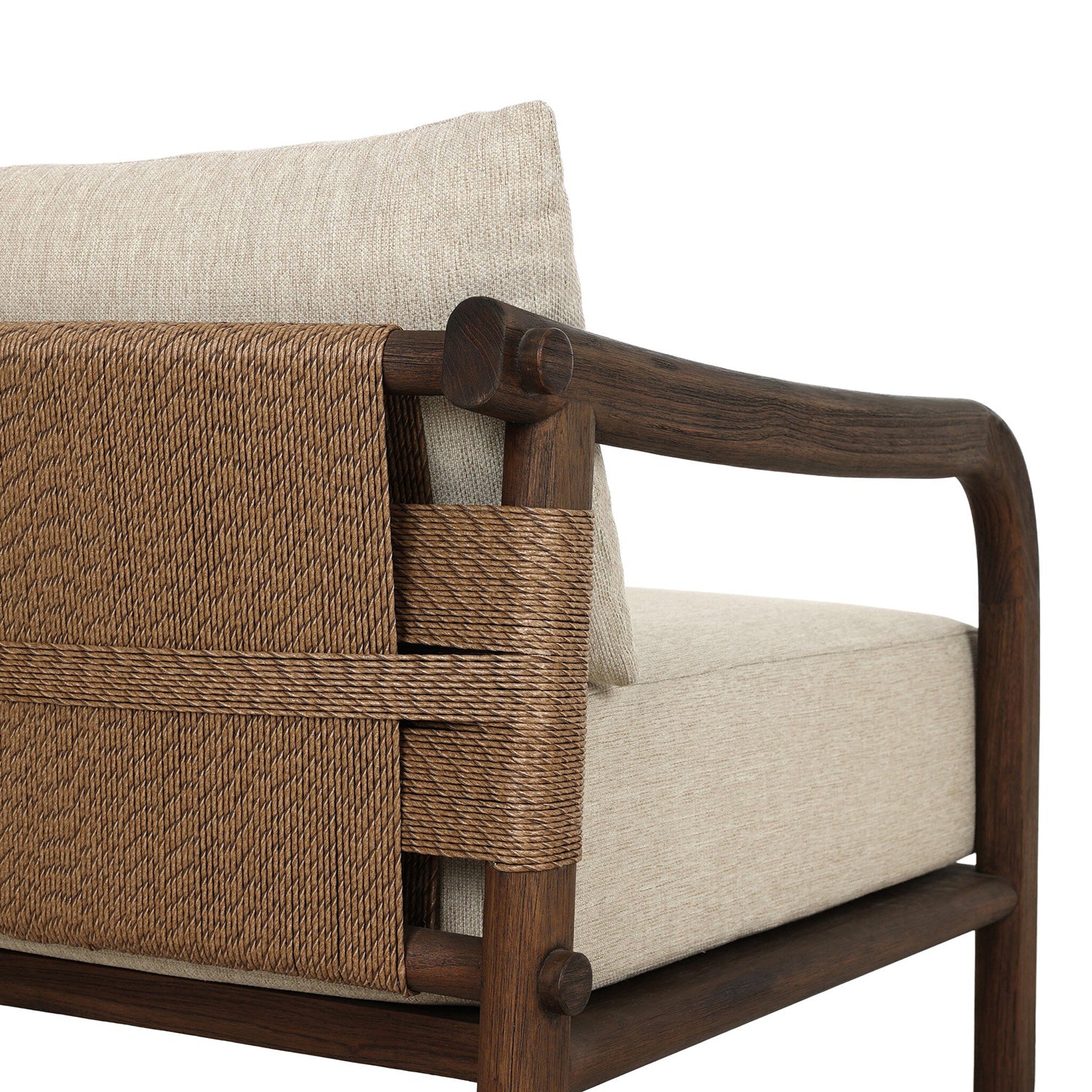 Four Hands Boda Outdoor Chair in teak with faux hyacinth weave and beige cushion, close-up detail, view 5