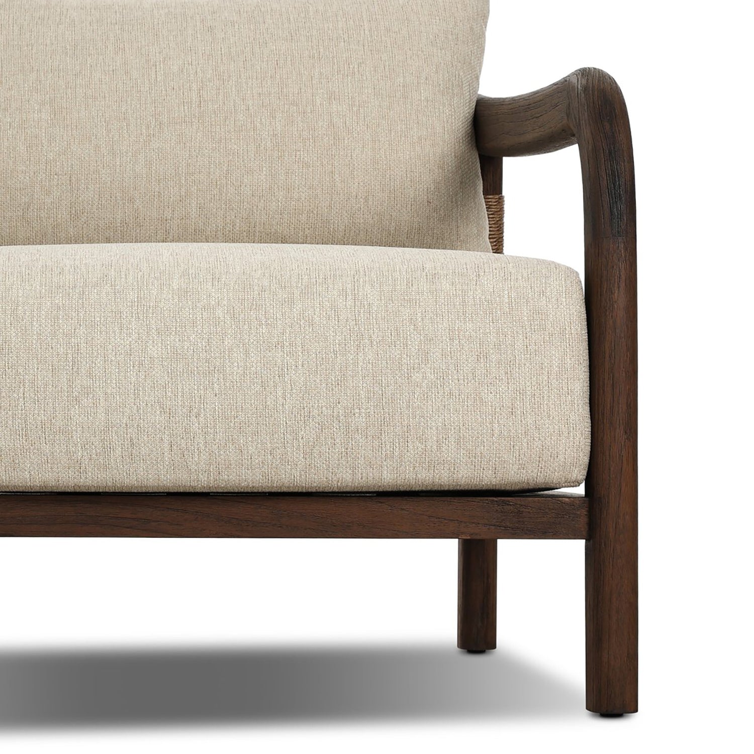 Four Hands Boda Outdoor Chair in teak with faux hyacinth weave and beige cushion, close-up detail, view 7