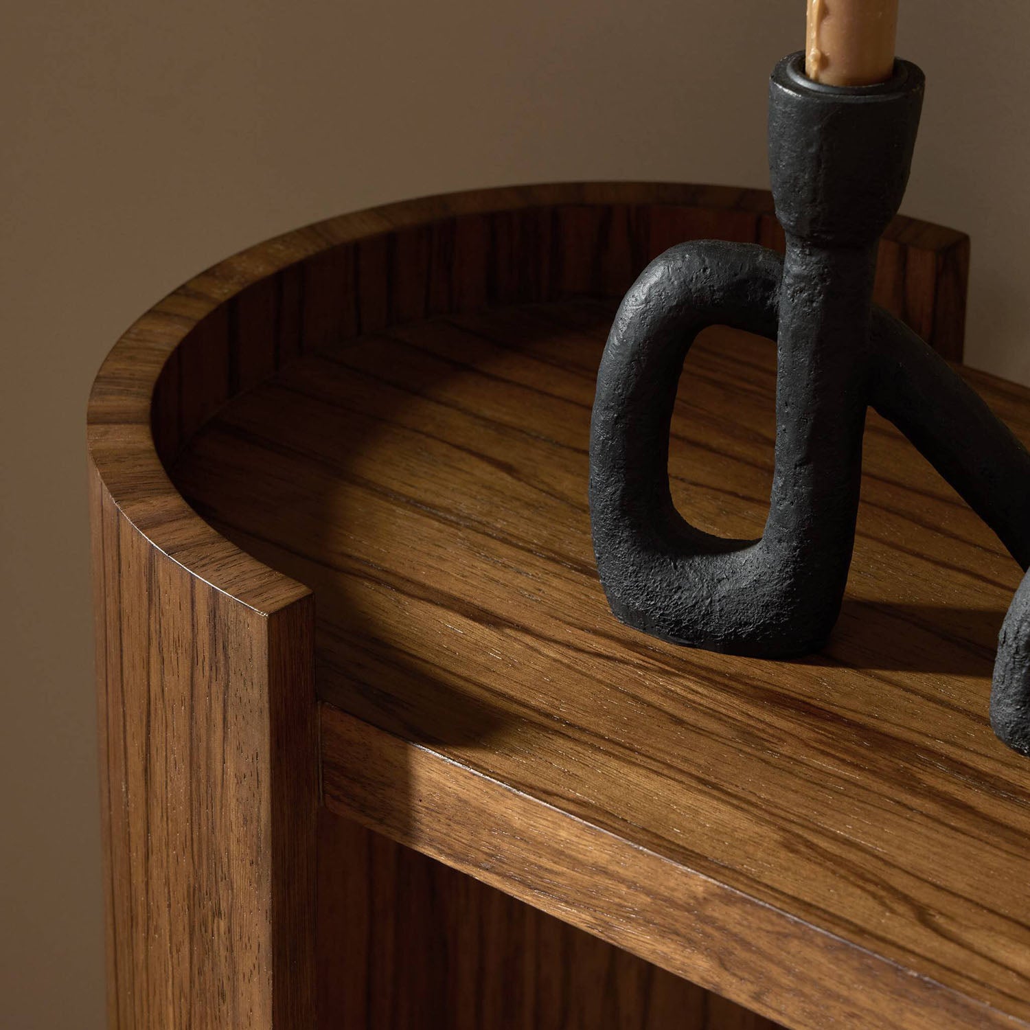 Four Hands Damari Console Table in medium brown limba, close-up detail of limba grain, view 1