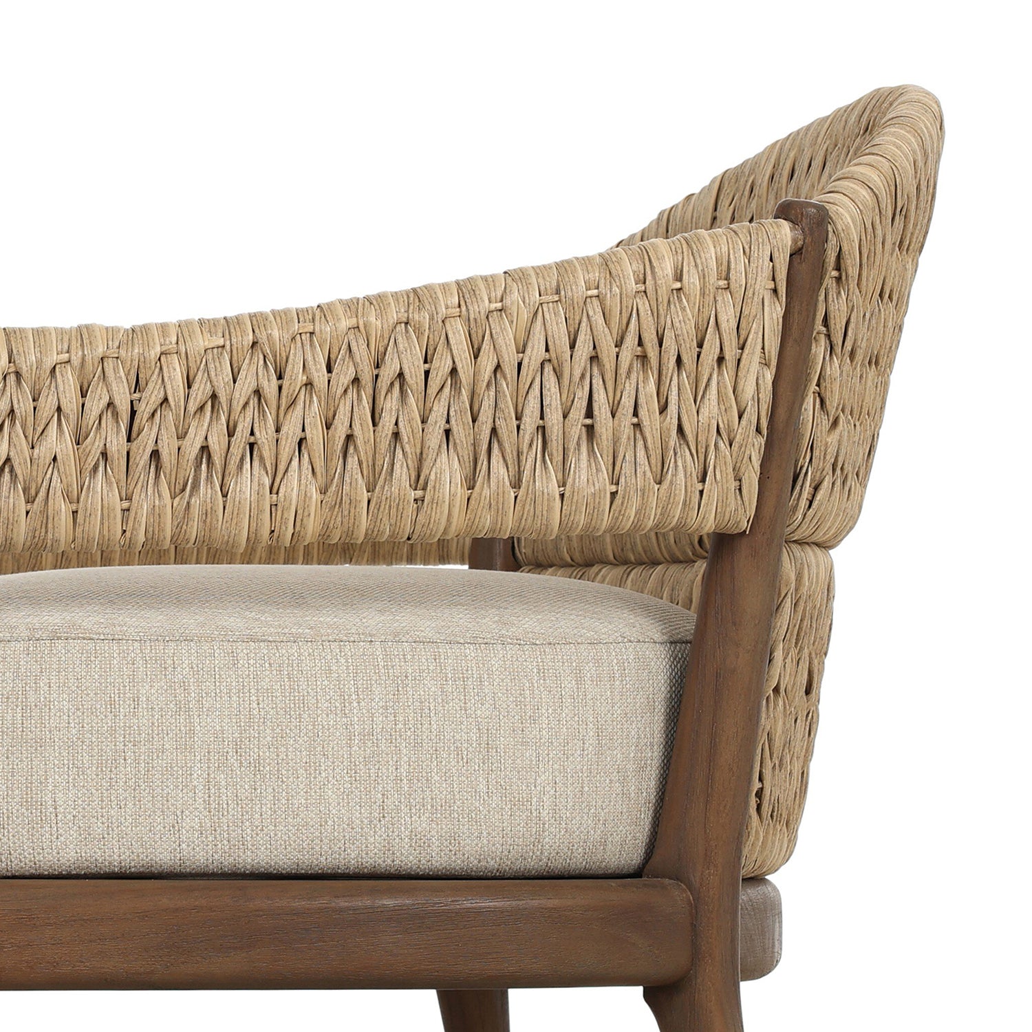 Four Hands Atwood Outdoor Chair in teak with coastal weave and beige cushion, close-up detail, view 3