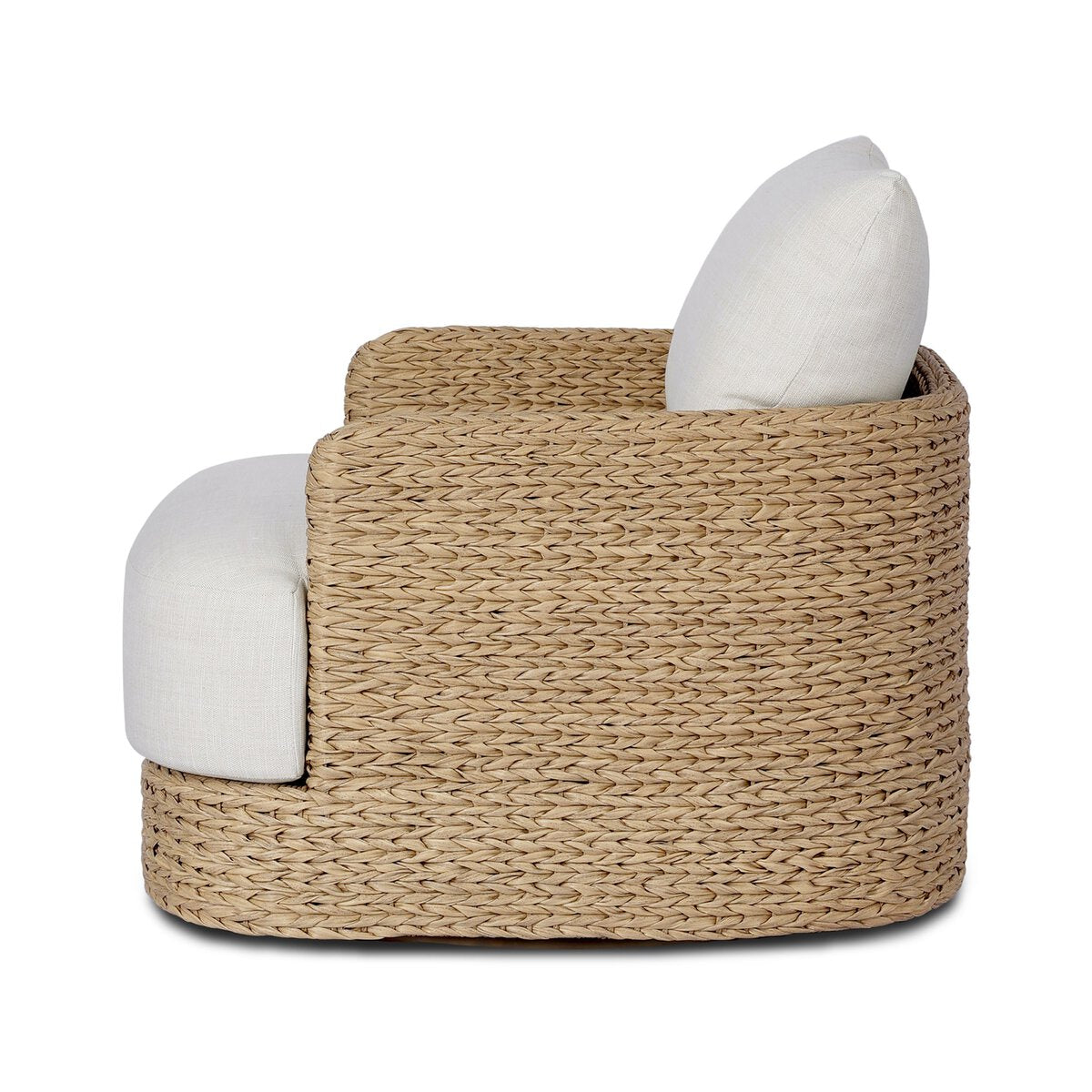 Four Hands Caney Outdoor Swivel Chair in coastal weave with cream cushion, side profile view