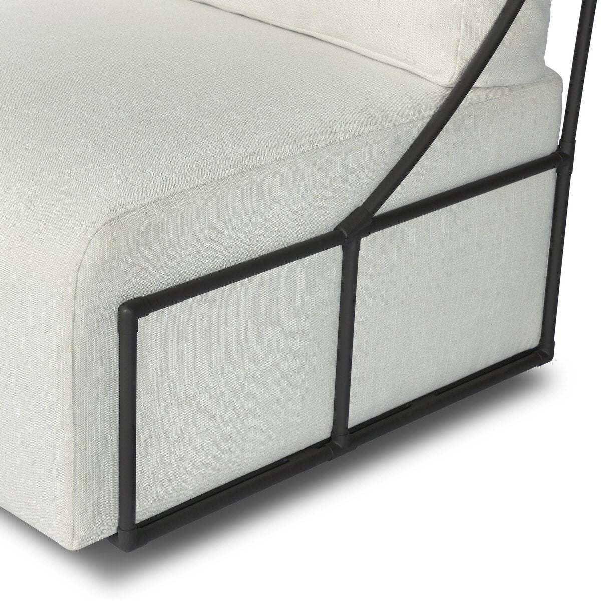 Four Hands Enola Outdoor Swivel Chair in bronze iron cross-hatch with cream cushion, close-up detail of ironwork, view 2