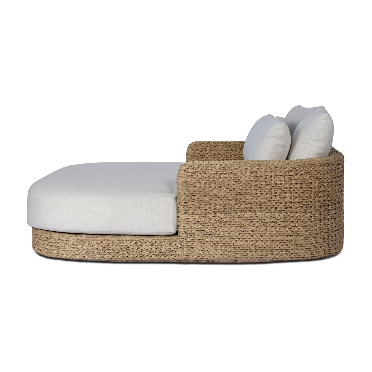 Four Hands Caney Outdoor Double Chaise in coastal weave with cream cushion, side profile view