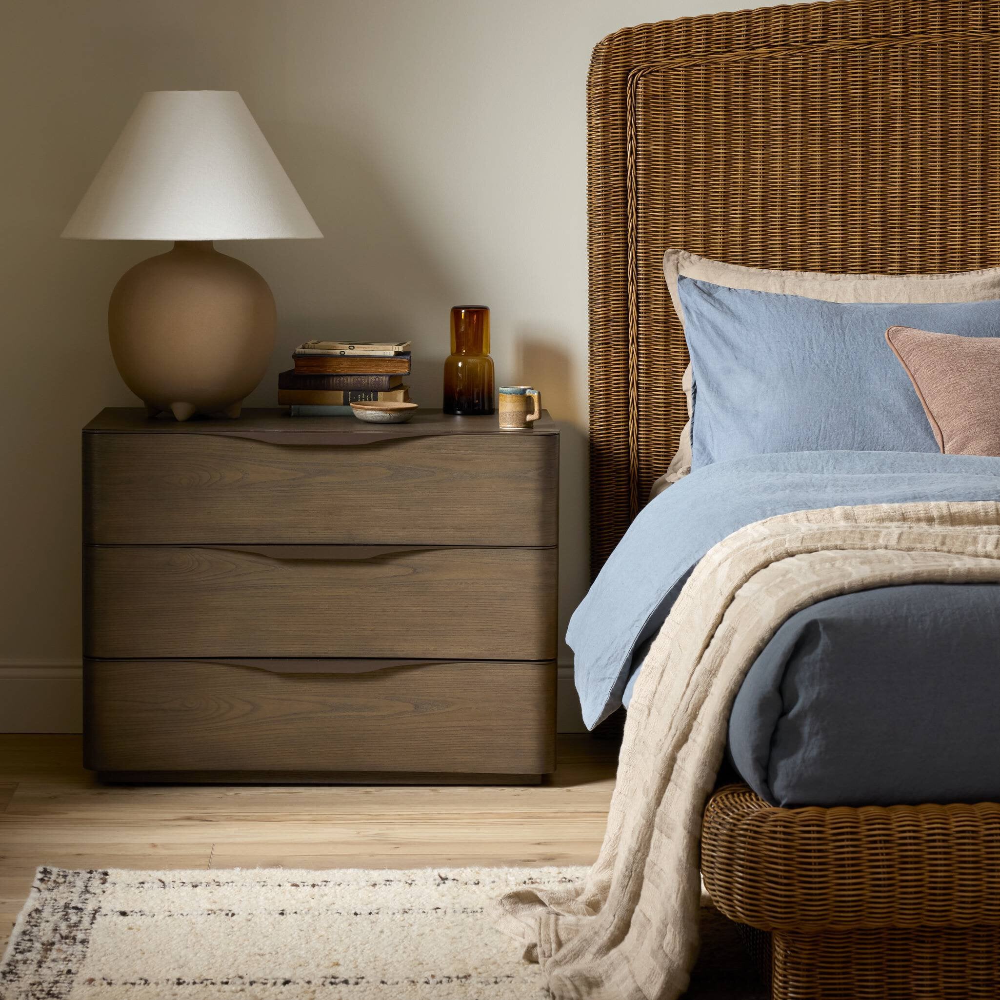 Four Hands Amiro Tumble Brown Ash Nightstand in a styled room setting