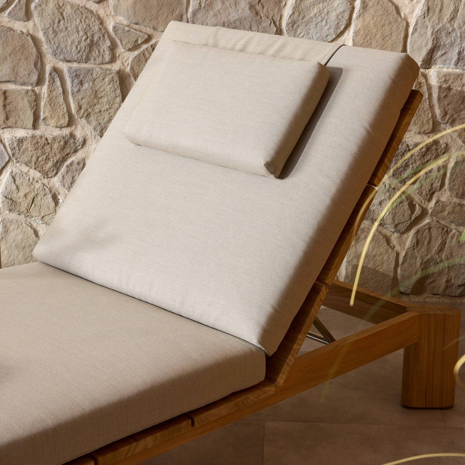 Four Hands Sterling Ibiza Mole Outdoor Chaise in golden teak with mocha acrylic cushion, alternate styled view, view 1