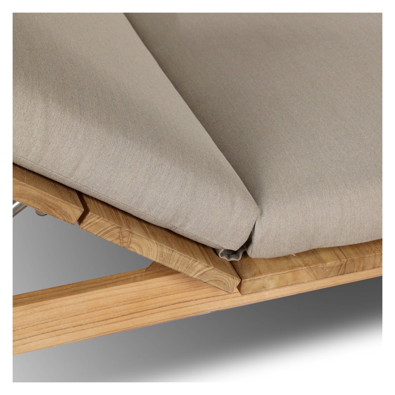 Four Hands Sterling Ibiza Mole Outdoor Double Chaise in golden teak with mocha acrylic cushion, close-up detail of cushion fabric, view 2