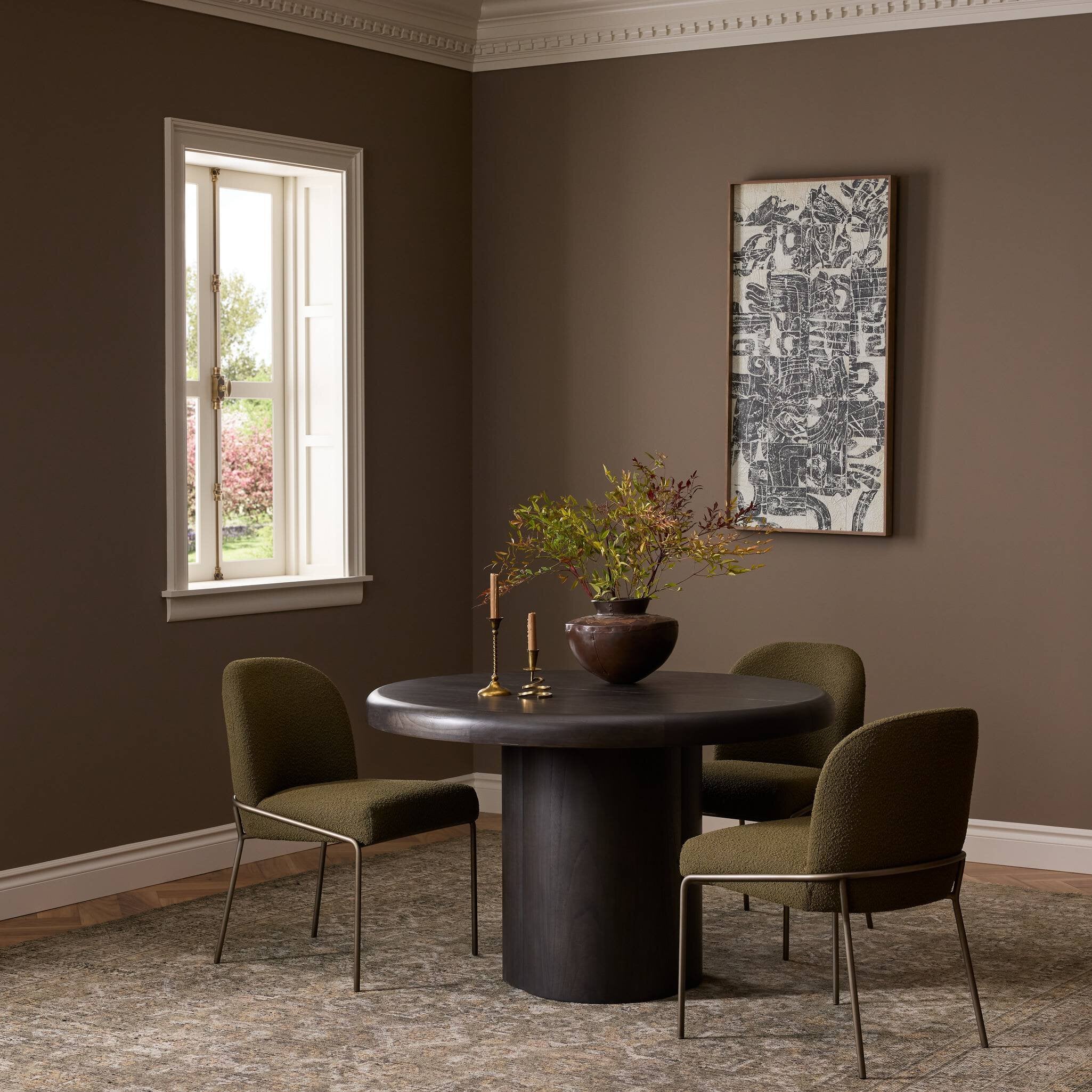 Four Hands Pemble Smoked Black Mindi Extension Dining Table - styled room setting