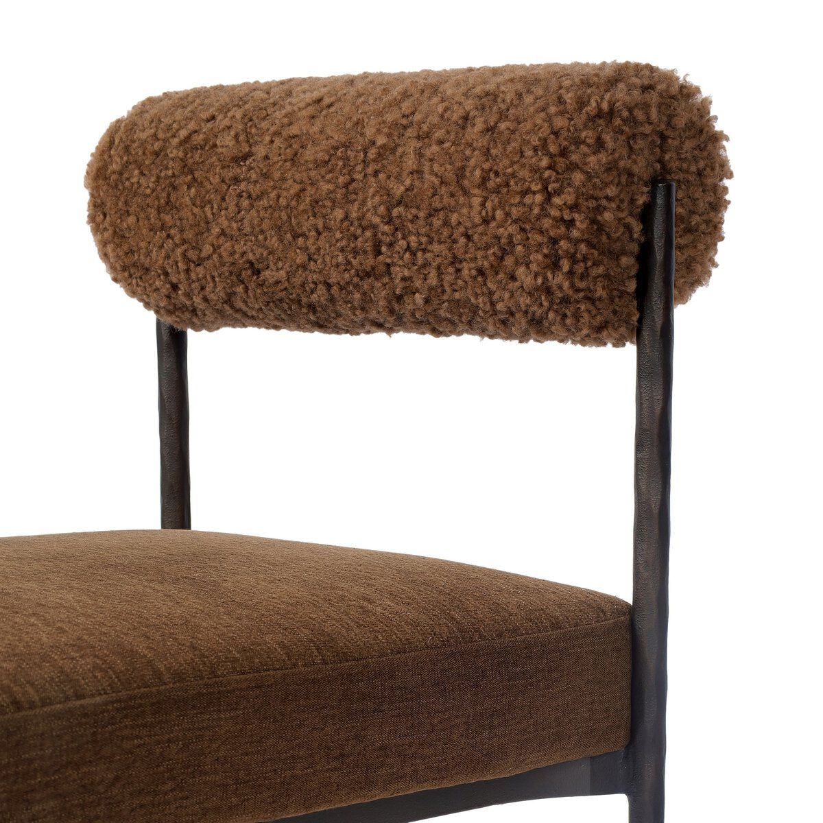 Four Hands Jazelle Laughlin Ochre Metal Dining Chair with amber shearling seat, close-up detail of shearling, view 2