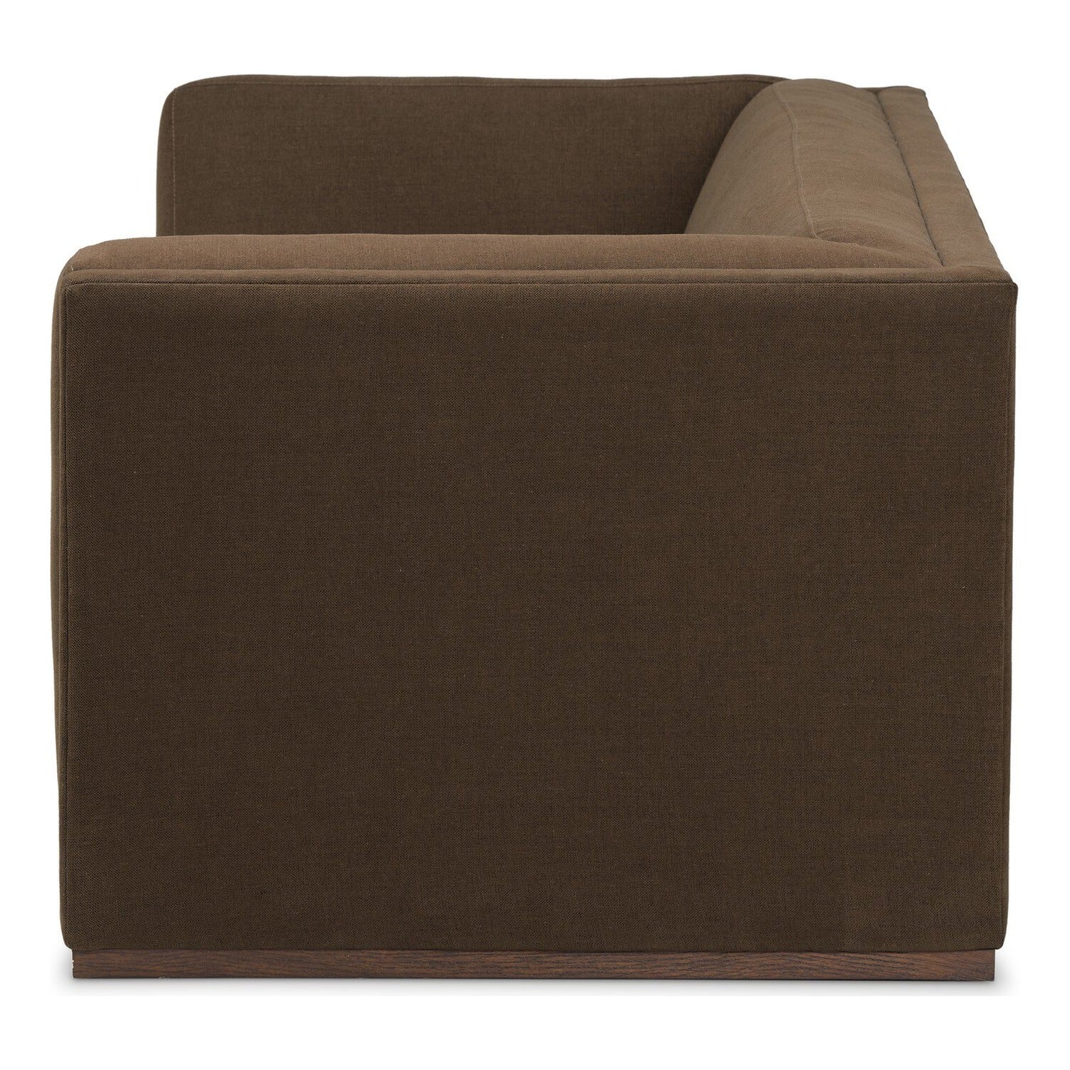 Four Hands Vince Crypton Nomad Mushroom 94in Tuxedo Sofa on wood plinth, side profile view