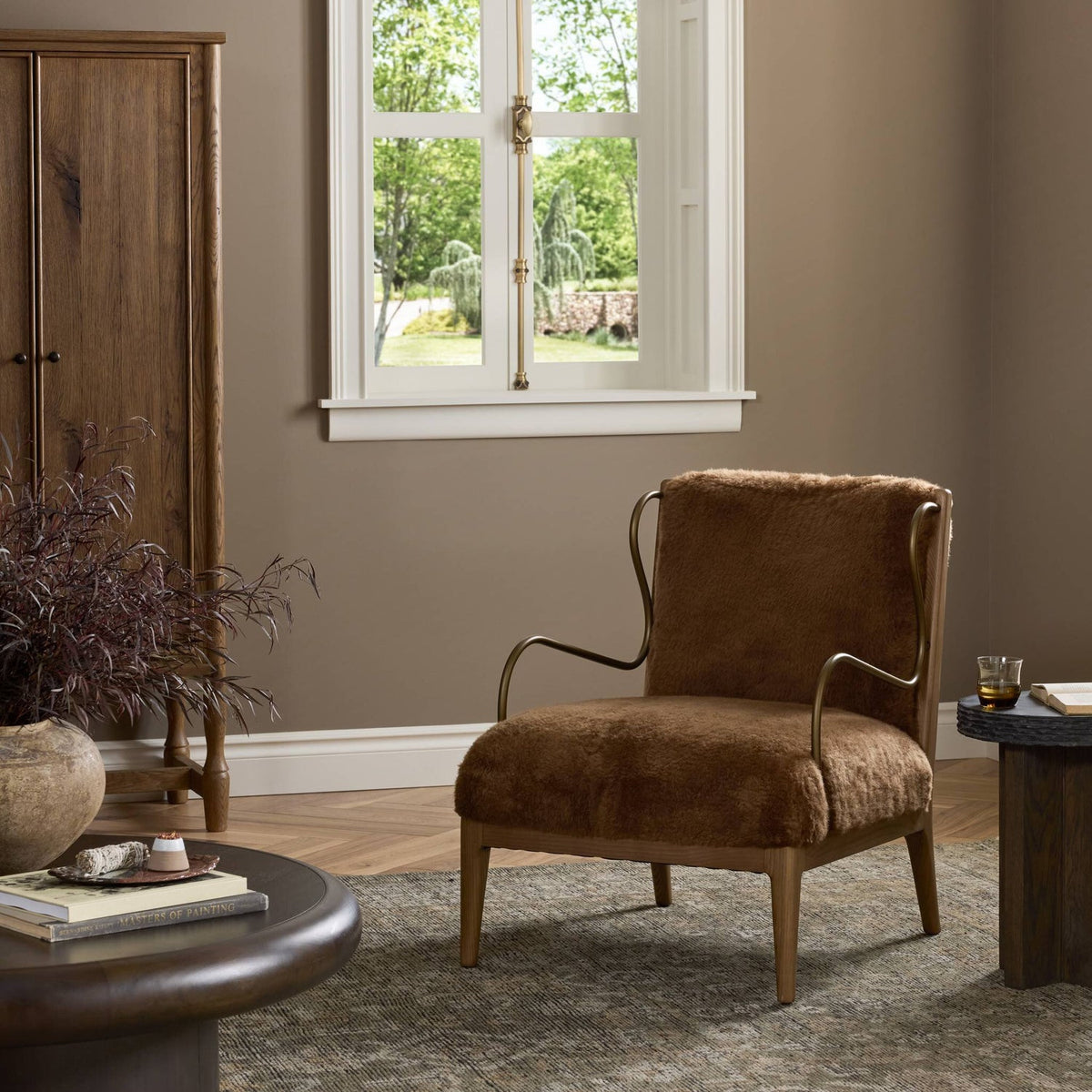 Four Hands Yesenia Ochre Shearling Chair styled in a room setting