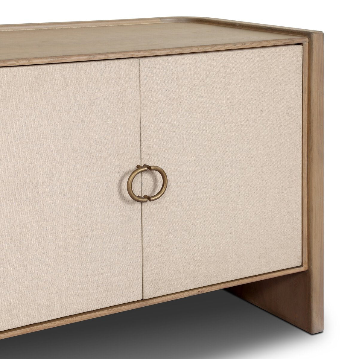 Four Hands Kiran Media Console in sandy oak and beige painted linen, close-up detail of iron hardware, view 2