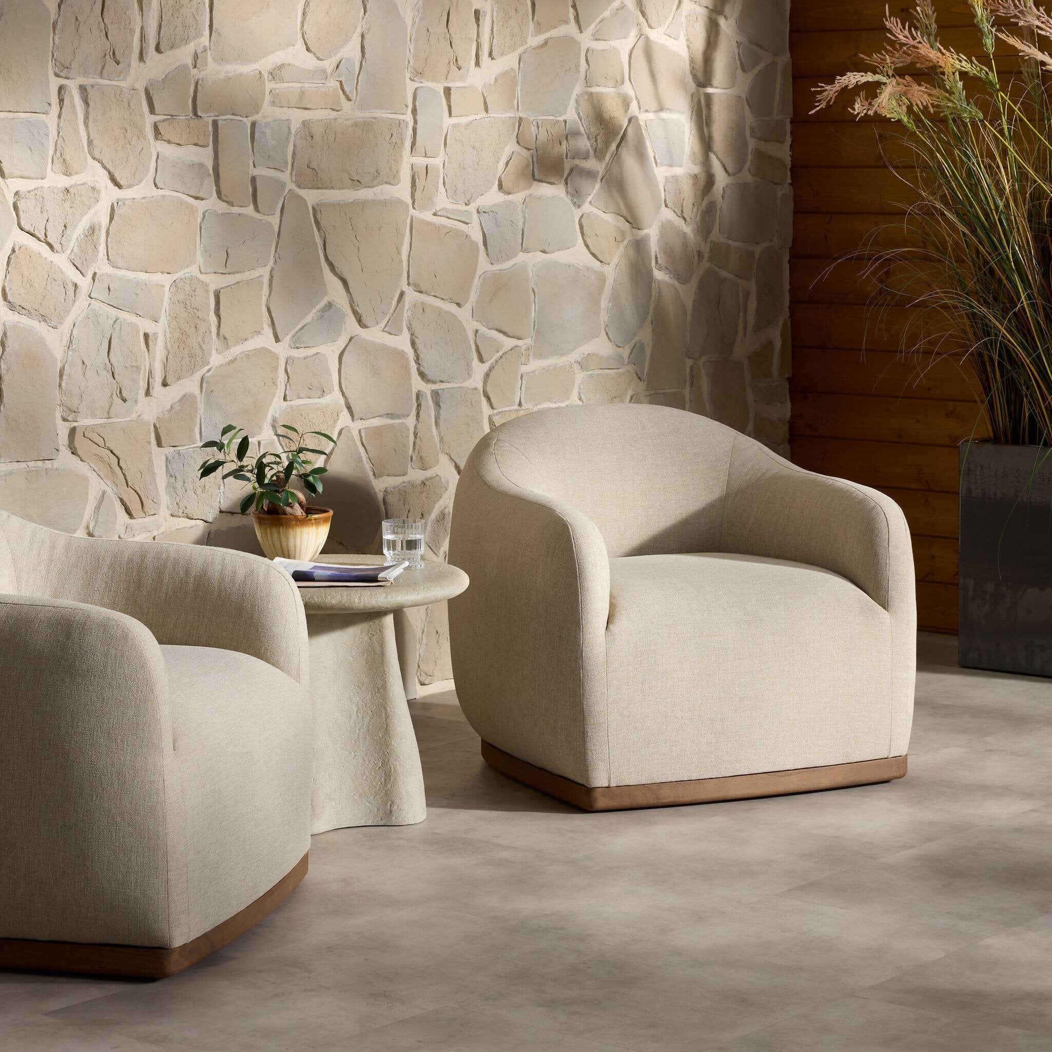 Four Hands Fabiana Alessi Buff Outdoor Chair in a styled room setting